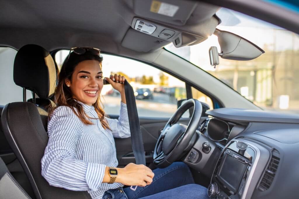 woman wearing seat belt safety first